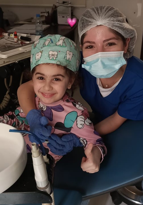 Dentist with child patient