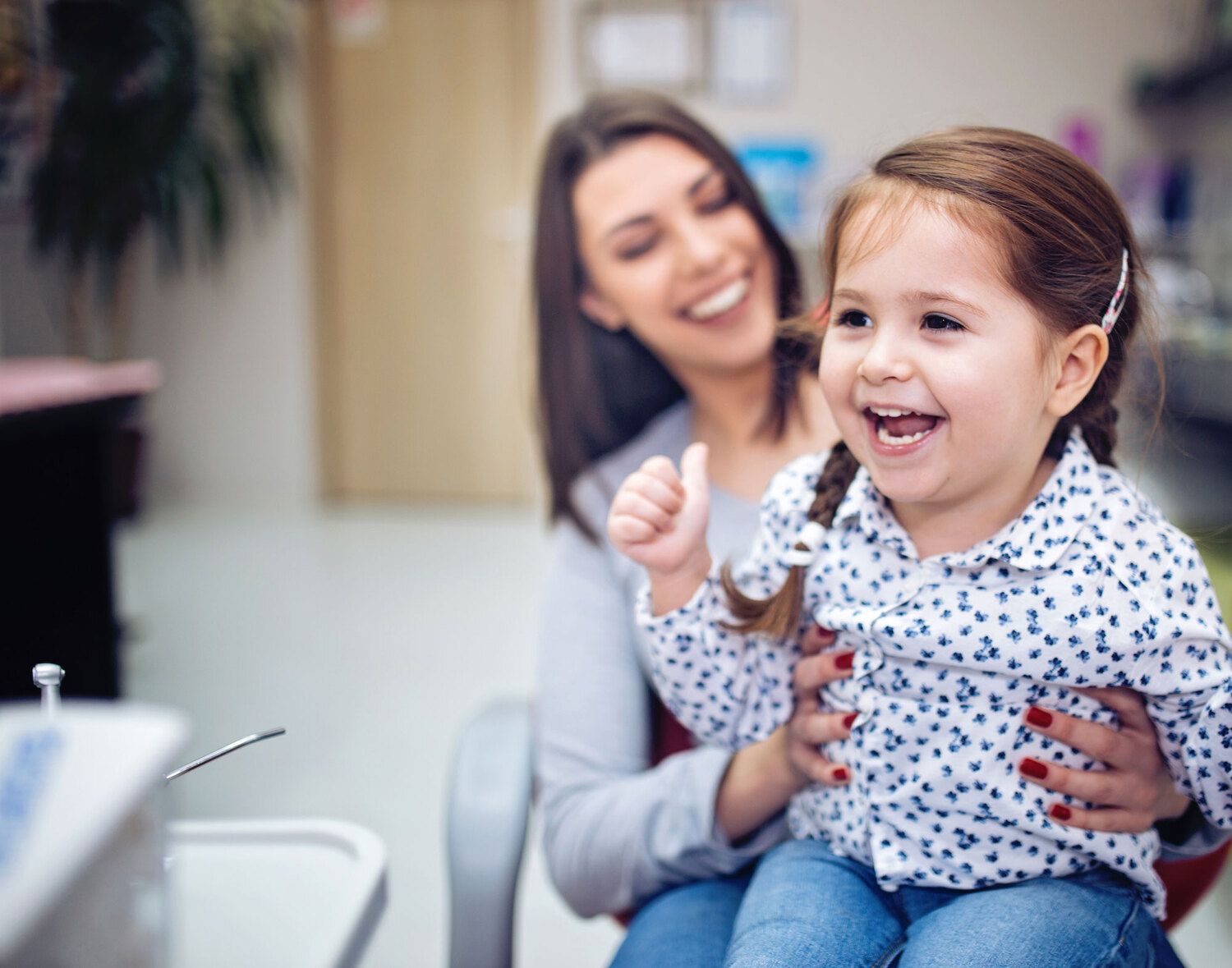 Dr. Marilyn Nohra with a young patient